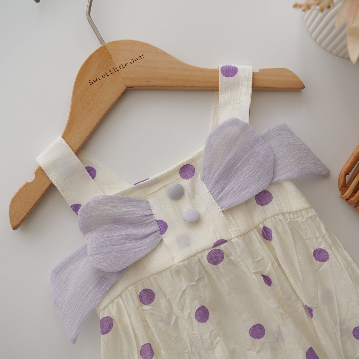 Polka Dot Ribbon Romper in Purple