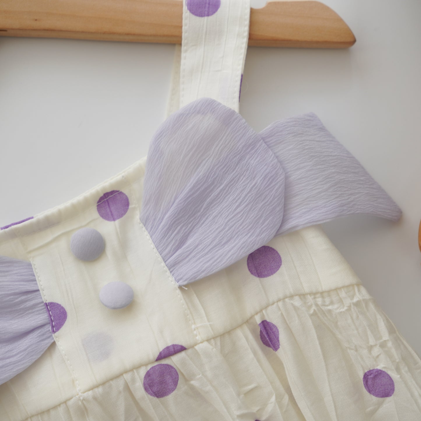 Polka Dot Ribbon Romper in Purple