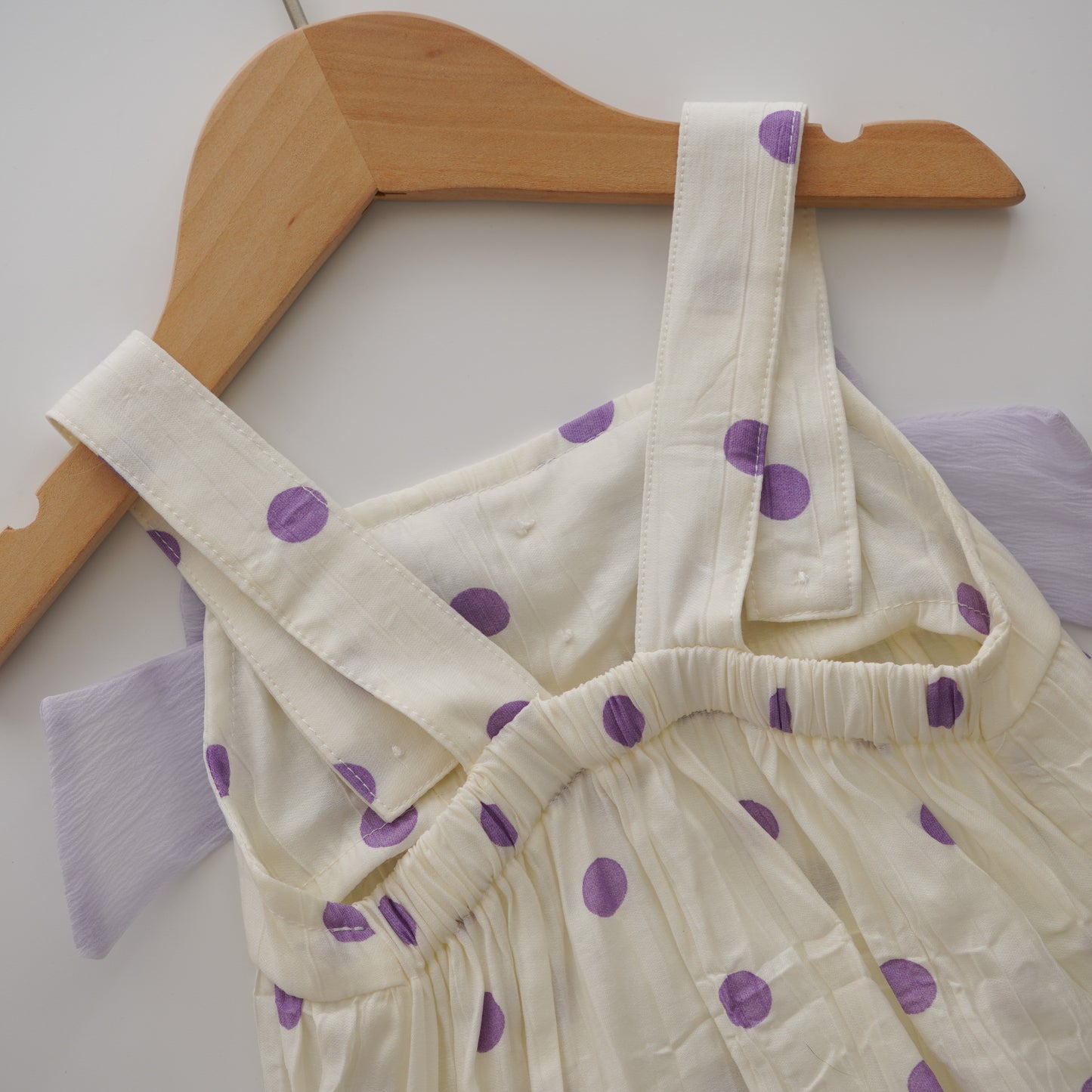 Polka Dot Ribbon Romper in Purple