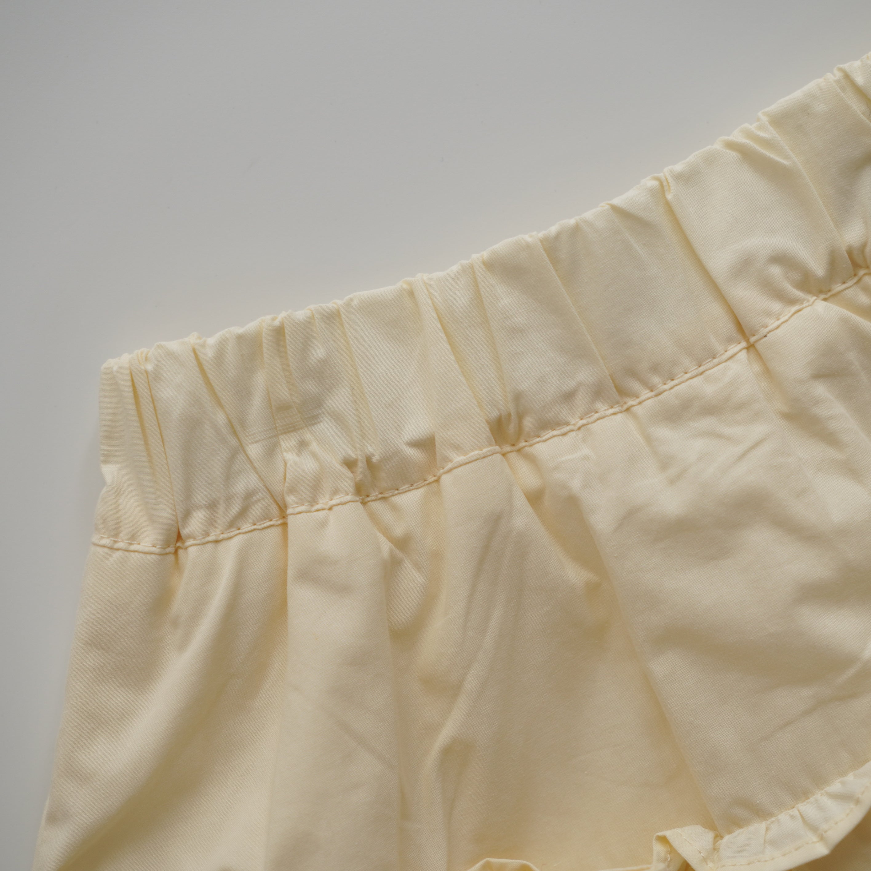 Knitted Sleeveless Top & Layered Skirt-Pants Set