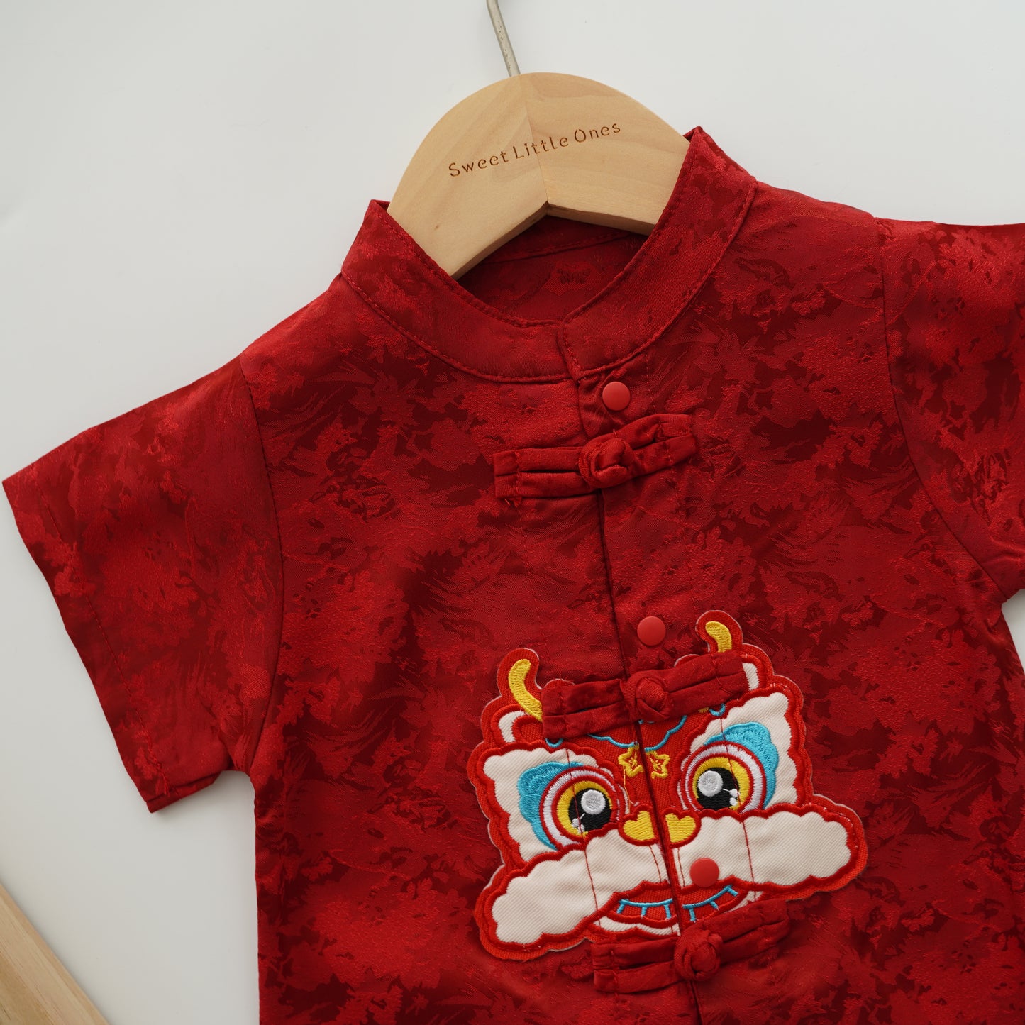 Lion Buttoned Chinese Romper