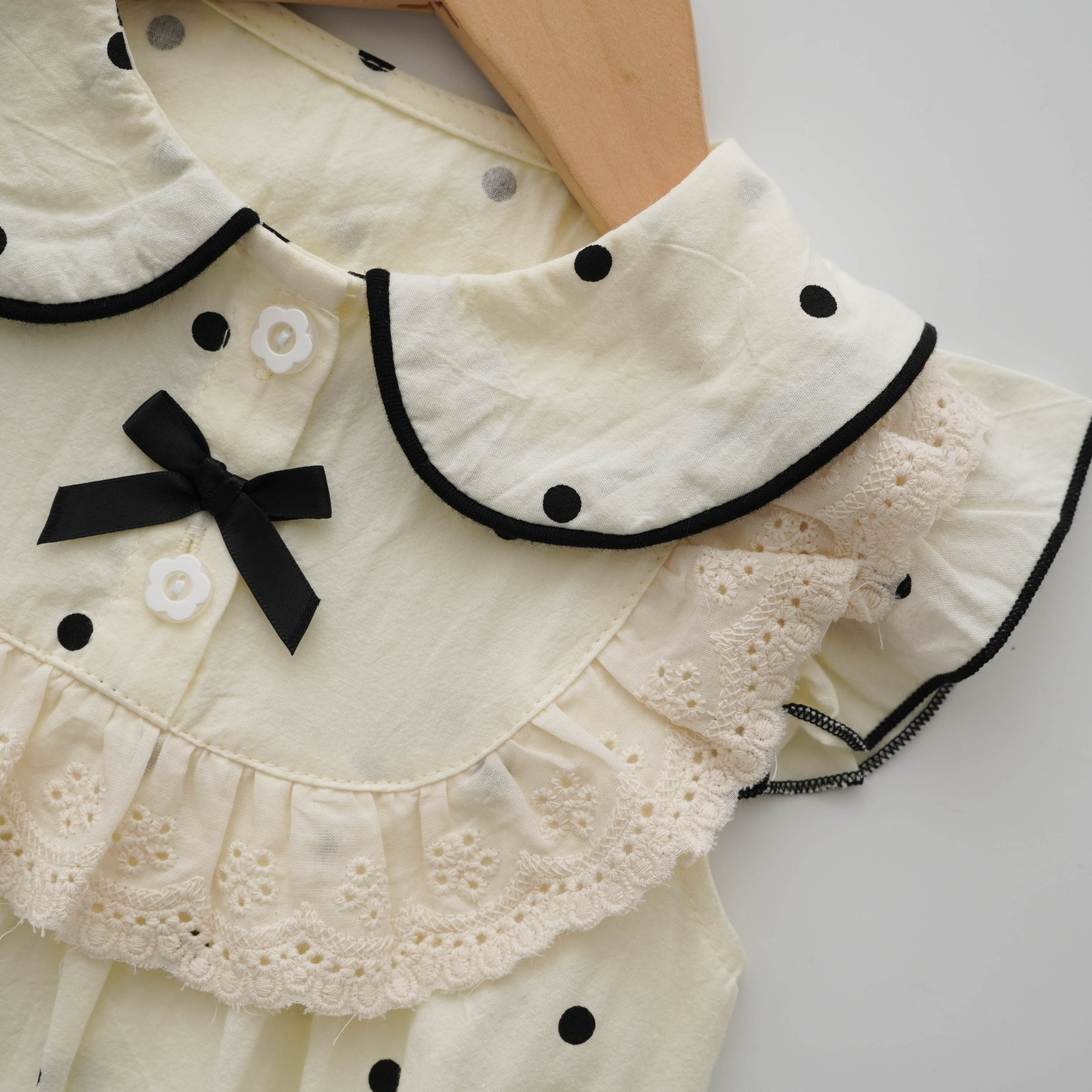 Polka Dot Buttoned Romper