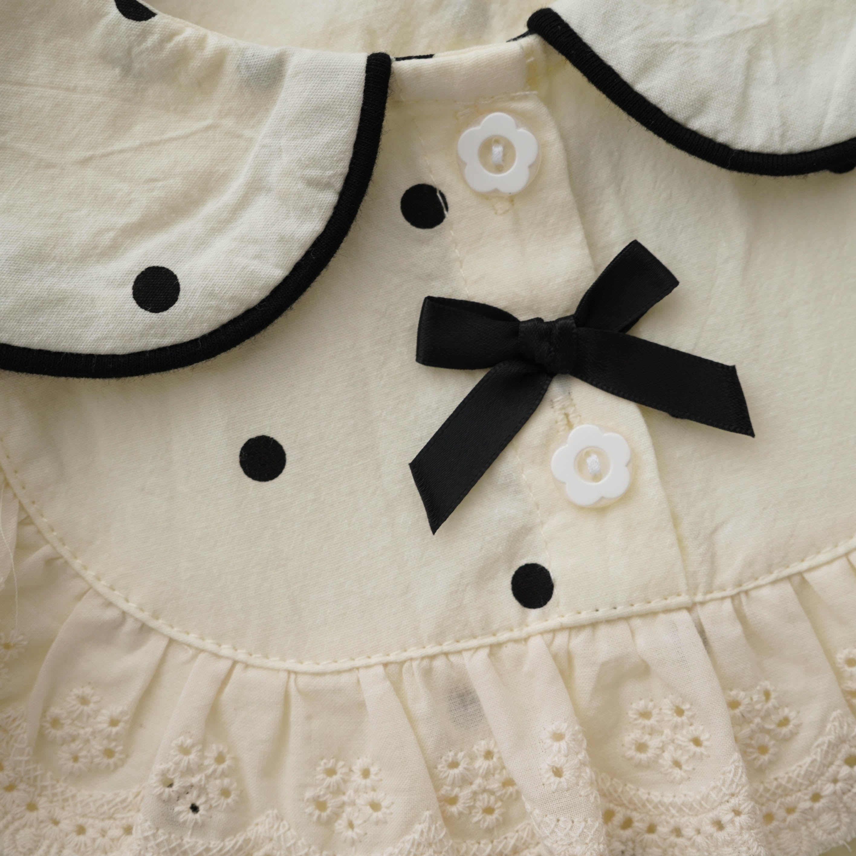 Polka Dot Buttoned Romper